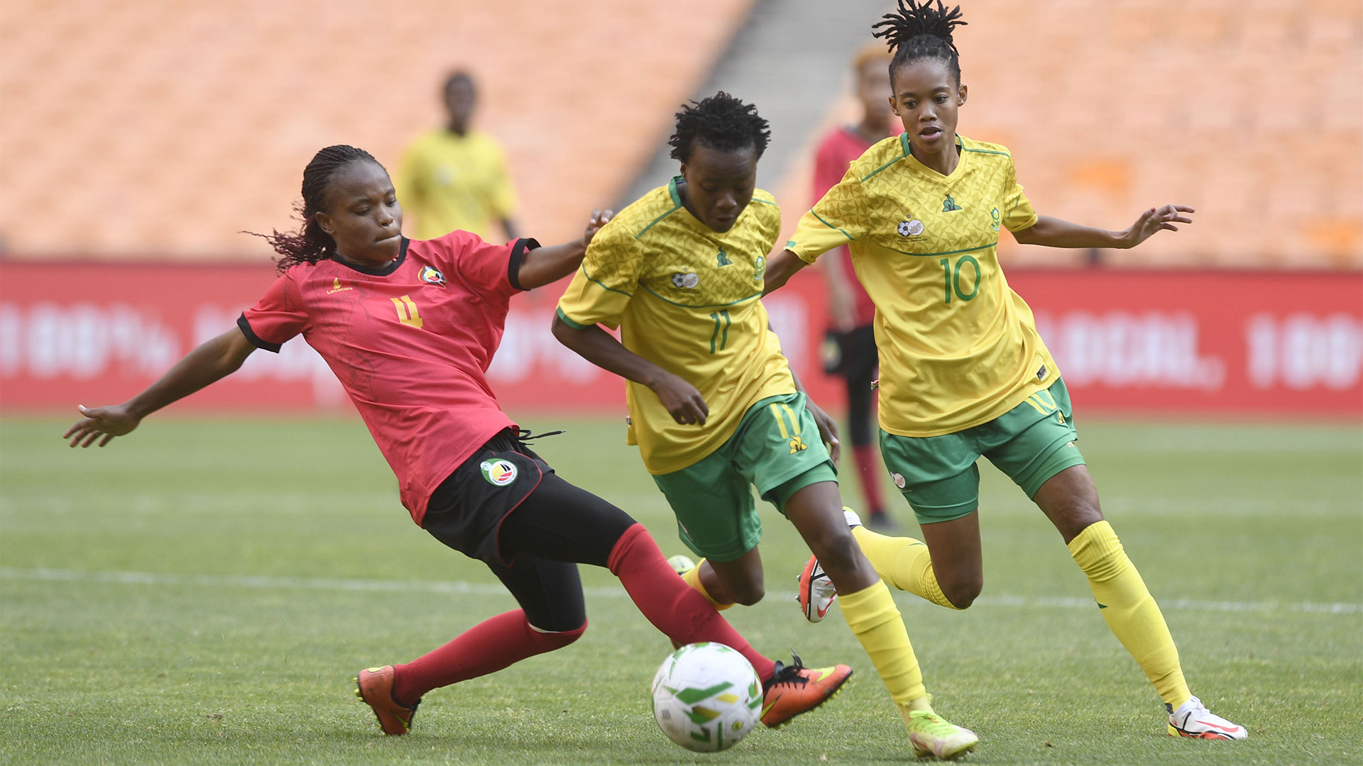 Banyana Banyana star, Thembi Kgatlana dribbles past Mozambican defender