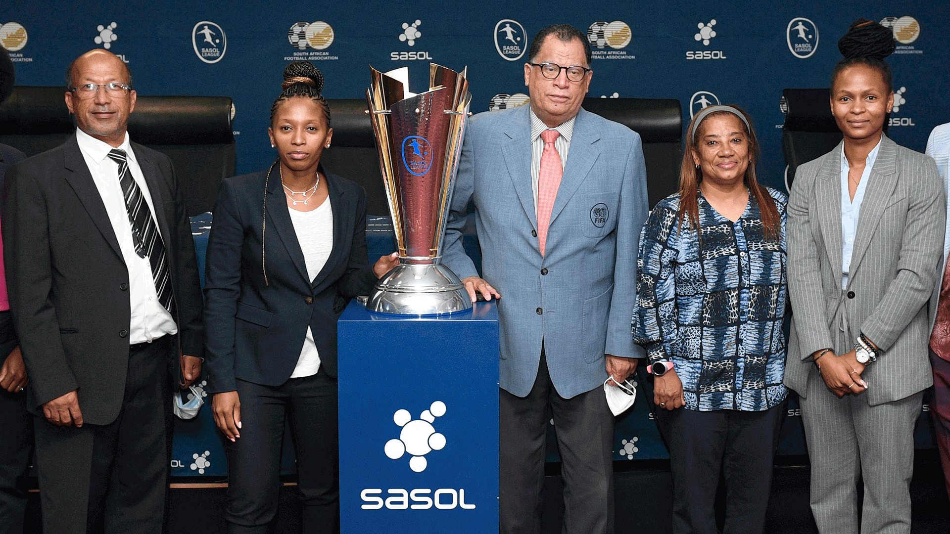 Sasol and SAFA dignitaries pose with the Sasol League championship trophy
