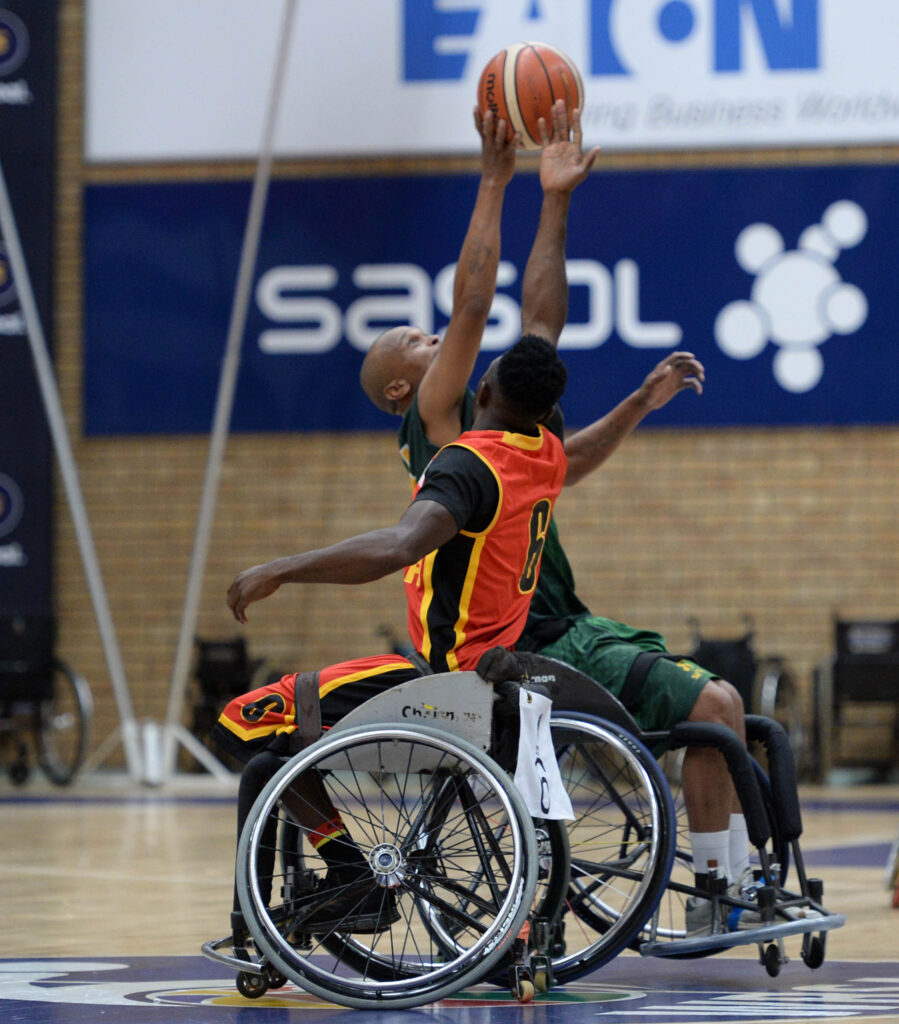 Elias Langerman of South Africa and Ntanda Afonso of Angola battle for possession at the tip off during the 2023 African Para Games Senior Mens Qualifier game between Angola and South Africa at Mandeville Sports Complex in Johannesburg